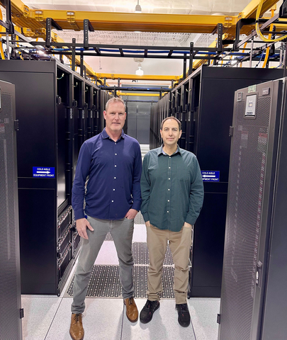 Summit CEO Warren Patterson and Deft co-founder Jordan Lowe at a Summit data center. (Photo: Business Wire)