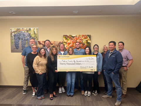 Tri Counties Bank presents Tulare County Ag Foundation with a <money>$30,000</money> donation for the “Sow the Seeds” Scholarship Program. Pictured from left to right: Scott Woodard, Foundation Board Member; Geneva Shannon-Orlopp, Foundation Board Member; Kerissa Chapman, Foundation Board Member; Adam Goltz, Foundation Board Member; Rose Pereirra, Community Development Officer for Tri Counties Bank; Anneke De Boer, Foundation Board Secretary; Stacy Coelho, Foundation Board Member; Josh Cox, Foundation Board Vice President; Lari Dawn Lawrence, Foundation Board Member; Allie Cardoza, Foundation Foard Member; Kim Pitigliano, Foundation Board Member; Brett Lew, Tri Counties Bank Commercial Regional Manager and Foundation Board President; and David Rocha, Foundation Board Treasurer. (Photo: Business Wire)