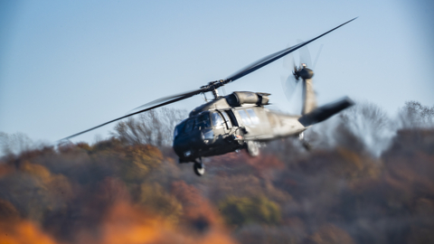 Sikorsky's Optionally Piloted BLACK HAWK helicopter equipped with MATRIX™ and Rain autonomy systems during fire localization and targeting demonstrations at Sikorsky HQ in Stratford, Connecticut. Rain, a leader in autonomous aerial wildfire containment technology, dispatched the aircraft to the ignition using its wildfire mission autonomy stack, which adapts autonomous aircraft with the intelligence to perceive, understand, and suppress wildfires before they grow out of control. (Photo: Business Wire)