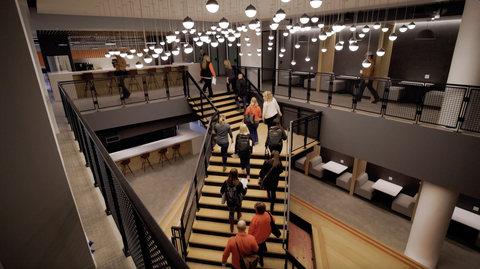 The Fiserv global headquarters in Milwaukee, Wisconsin, includes features designed to inspire collaboration, including The Connector, a strategically placed set of stadium stairs that serve as a ‘connector’ from floor to floor and create an expansive open-concept experience to inspire movement, collaboration and innovation at its best. (Photo: Business Wire)