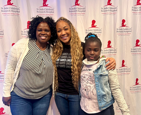 Erica Campbell with St. Jude patient Avery and her mom, Valentine. (Photo: Business Wire)