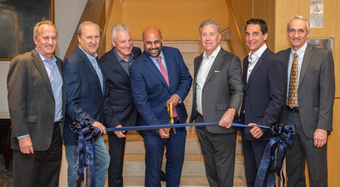 The ribbon is officially cut at the DoubleTree by Hilton and The Revel Apartments in Downtown Hartford. Pictured left to right: Mark Wolman, Principal, Waterford Group; Michael Freimuth, Executive Director, Capital Region Development Authority; Len Wolman, Chairman, Waterford Group; Mayor Arunan Arulampalam, City of Hartford; The Honorable Ned Lamont, Governor, State of Connecticut; Randy Salvatore, President & CEO, RMS Companies; William Fortier, Senior Vice President – Development, Americas, Hilton.