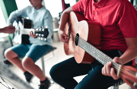 thumbnail Music programs in schools increase attendance and allow students to express themselves (Photo: Business Wire)