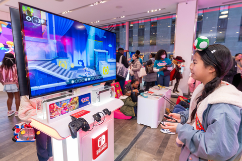 In this photo provided by Nintendo of America, Madison C., 12, plays as Swordfighter Peach at the Nintendo New York store in Rockefeller Center to celebrate the game launch of Princess Peach: Showtime!.