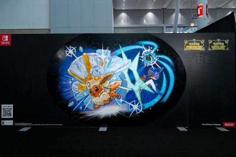 Nintendo of America unveiled a hand-painted mural featuring a “Terastallizing” Eevee from the Pokémon Scarlet and Pokémon Violet games during PAX East in Boston. The mural, along with gameplay stations and appearances from the Pikachu and Eevee costumed characters, will continue through the close of the convention on Sunday, March 24.