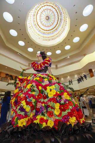 A colorful floral mannequin on display at South Coast Plaza, one of 15 mannequins created by local florists as part of the Fleurs de Ville exhibition in 2023. Fleurs de Ville 2024 will be part of the 34th annual Southern California Garden Show at South Coast Plaza, the luxury shopping center in Costa Mesa, California. Photo by Capture Imaging courtesy of South Coast Plaza