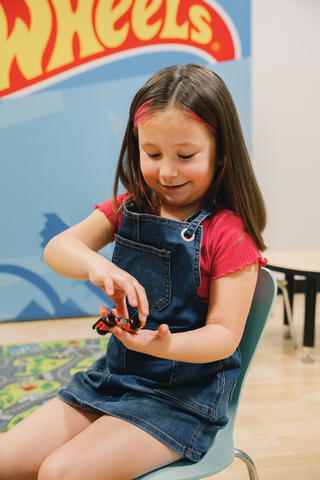 Child playing with Mattel's Hot Wheels® Flippin Fast™ die-cast, a new vehicle designed to encourage an open-ended play experience, developed in partnership with the Autistic Self Advocacy Network (ASAN). (Photo: Business Wire)