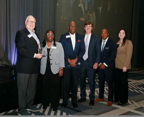 Arvest Bank received the 2024 CARE Award from the Federal Home Loan Bank of Dallas (FHLB Dallas). Tim Carter, left, FHLB board member stands with officials from Arvest Bank and FHLB Dallas. (Photo: Business Wire)