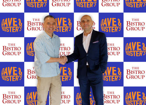 Antonio Bautista, Chief International Development Officer of Dave & Buster’s and Paul Manuud, President of The Bistro Group (Photo: Business Wire)