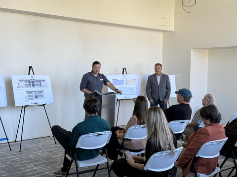 Brandon Sundeen, Vice President of the Columbia County Museum Association and Casey Garrett, Chair of the Columbia County Board of Commissioners spoke at an exclusive media event at the historic John Gumm Building. (Photo: Business Wire)
