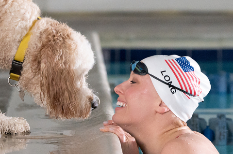 16-time Gold medalist Paralympian Jessica Long shares a heartwarming moment with her loyal companion, Goose, who is always there to lift her spirits and lend emotional support. See their incredible story at https://nulo.com/ambassador-stories/jessica-long-and-goose (Photo: Business Wire)