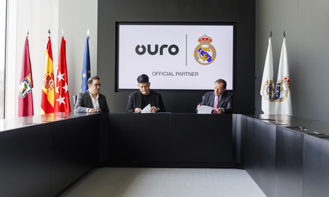 The signing event held April 15 in Madrid with Ouro founders Bertrand Sosa and Roy Sosa and Emilio Butragueño, Real Madrid's Director of Institutional Relations. (Photo: Business Wire)