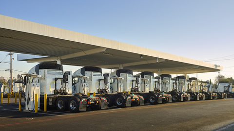 Electric drayage trucks charging at one of Voltera’s port charging stations (Photo: Business Wire)