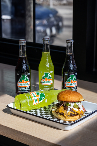 thumbnail The So-Cal Burger at Hi5 Burger in Calgary, perfectly paired with either a Mexican Cola or Lime Jarritos. (Photo: Business Wire)