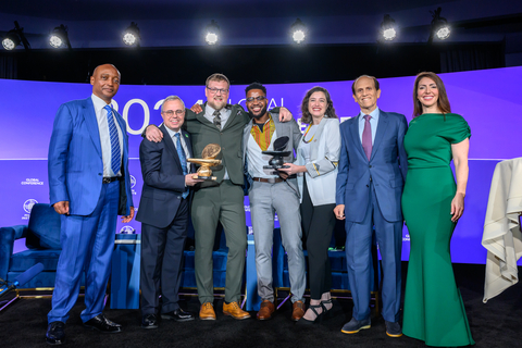 Winners of the Milken-Motsepe Prize in Green Energy, Carl Telford and Jonathan Wilson from Aftrak, and runners-up Randy Kabuya and Deney van Rooyen from Omnivat pictured with Patrice Motsepe, Mike Milken, and Emily Musil Church at the Milken Institute Global Conference. (Photo: Business Wire)