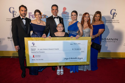 original This Saturday South Florida’s philanthropic community celebrated the 22nd Annual Fed/Ex St. Jude Angels and Stars Gala, which raised $785,000 for the children of St. Jude Children’s Research Hospital. St. Jude patient Misheel poses with Jorge Vargas, Michelle Vargas and members of the presenting sponsor team at Genesis Fortune, LLC. (Photo: Carlos Aristizabal)