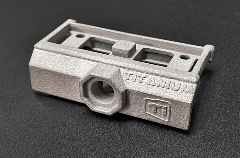 TriTech Titanium Parts LLC in Detroit is now binder jet 3D printing titanium alloy Ti64 parts, such as the one shown here, on its Production System™ P-1 system using a Reactive Safety Kit now available for purchase. (Photo: Business Wire)