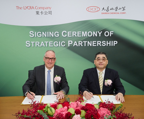 thumbnail Left to Right: Steve Stewart, chief brand and innovation officer, The LYCRA Company, and Shean-Tung Lin, Chairman, Dairen Chemical Company (DCC), sign a letter of intent for DCC to convert QIRA® into low-impact PTMEG for bio-derived LYCRA® fiber. (Photo: Business Wire)