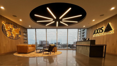 original Axis Communications opened its latest Axis Experience Center (AEC) at 17 Cowboys Way, Suite 700, Frisco, TX 75034 on Wednesday, May 8, 2024. The new state-of-the-art facility was built to accommodate the need for a greater Axis presence in North Texas and better serve customers as the Axis product portfolio expands and its partner ecosystem grows. (Photo: Business Wire)