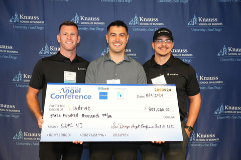 Left to right: Ecodrive Co-Founders Blake Ruschman, Trevor Laudate, and Markus Rommel hold $300,000 investment check from the San Diego Angel Conference at the University of San Diego for their startup that makes sustainability accessible, transparent, and effective. (Photo: Business Wire)