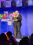 Shelly Ibach, Chair, President and CEO, Sleep Number, and David Benson, Executive Vice President, North Region, American Cancer Society, accept the Golden Halo Award for Best Intersectional Initiative in 2024 (Photo: Business Wire)