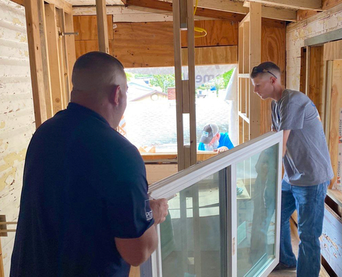 A window being prepared for install by NewSouth Window Solutions' installer team during the NOMORE Foundation donation (Photo: Business Wire)