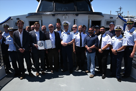Sea Change COI ceremony took place onboard the bow of the vessel, with several members of the US Coast Guard and other project stakeholders (Photo: Business Wire)