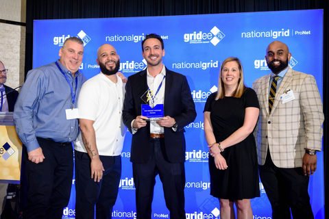 Mike Cook, Co-Founder & Chief Growth Officer of Runwise, accepts the Top ProNet Partner award from National Grid. (Photo: Business Wire)