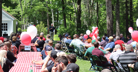 original Hussey Seating Company employees celebrating FY24 success (Photo: Business Wire)