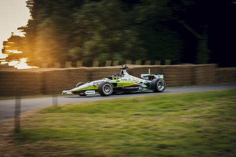 The world's fastest autonomous racecar with an AI pilot coded by students from PoliMOVE-MSU team races on Goodwood Hill.  Credit Indy Autonomous Challenge. (Photo: Business Wire)