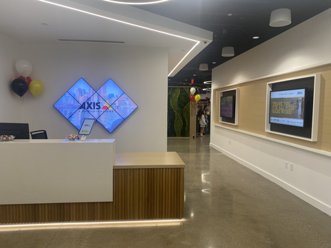 original Axis Communications celebrated the re-opening of its Boston-area Axis Experience Center (AEC) at 300 Apollo Drive, Chelmsford, MA 01824 on Wednesday, June 12, 2024. The state-of-the-art facility accommodates the need for a greater Axis presence in New England and better serves customers as the Axis product portfolio expands and its partner ecosystem grows. (Photo: Business Wire)