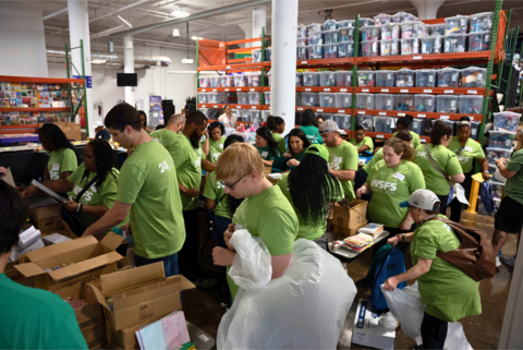 Team WSFS Associates volunteer at Cradles to Crayons for We Stand for Service Day. (Photo: Business Wire)