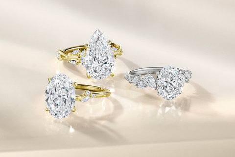 Brilliant Earth Signature Bridal Collections Engagement Rings: (clockwise from top) - Secret Garden Pear Diamond Ring in Yellow Gold, Olivetta Tapered Oval Diamond Ring in White Gold, Camellia Milgrain Oval Diamond Ring in Yellow Gold. (Photo: Business Wire)