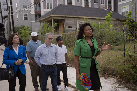 IMAGE DISTRIBUTED FOR FREEDMEN'S TOWN COMMUNITY INVESTMENT INITIATIVE - Zion Escobar, founder and CEO of the Freedmen's Town Community Investment Initiative, leads a walking tour of the neighborhood during the organization's launch event in Houston on June 21, 2024. The first pilot project spearheaded by the Initiative is the Victor Street Historic Rehab Project, a landmark effort that will restore the last row of 10 iconic shotgun houses built in Freedmen's Town in 1930. The Initiative will also add six new accessory dwelling units (ADUs), transforming Victor Street into a beacon of heritage and progress. The units are designed for families earning 30-80% of the area median income (AMI) and are backed by a 99-year deed-enforced affordability covenant. (Danielle Villasana/AP Content Services for Freedmen's Town Community Investment Initiative)