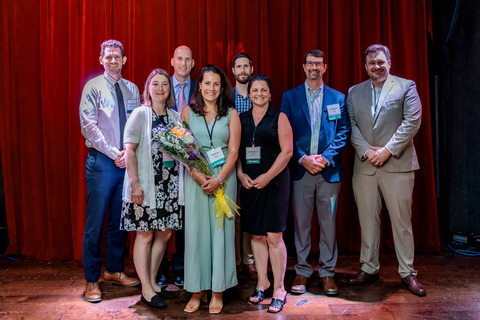 Eversource's Clean Technologies team accepts the Community Choice Award from the Environmental Business Council of New England. (Photo: Business Wire)