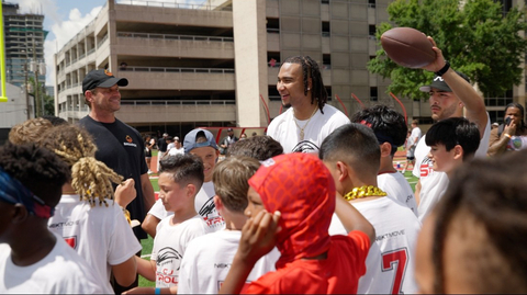 Ballogy Founder and CEO, Todd Young with Houston Texans Quarterback C.J. Stroud at Stroud Football Camp in Houston. (Photo: Business Wire) />
 <p style=