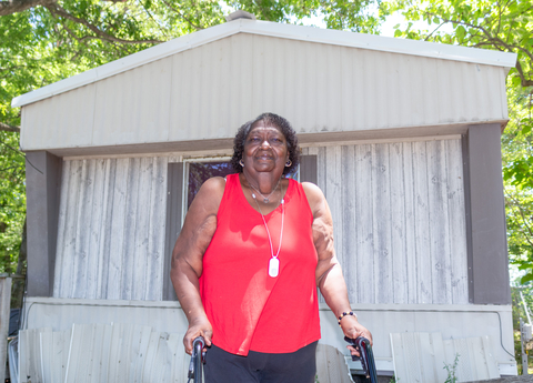 Dankie Paynes in front of her home. (Photo: Business Wire)