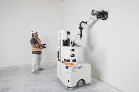 Launching today, Canvas' compact 1200CX drywall finishing robot is designed to be operated by workers, using robotic precision to spray-apply all of the joint compound onto the wall in a single step, reducing the time required to finish mud application and sanding from five to two days. (Photo: Business Wire)