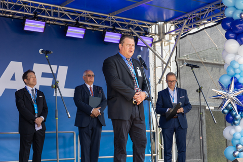 Jaxon Lang, AFL President and CEO (Front), (Left to Right) Naoki Okada, Director, President and CEO Fujikura Ltd. and Jaroslaw Zieba- Deputy Mayor of Gliwice. (Photo: Business Wire)