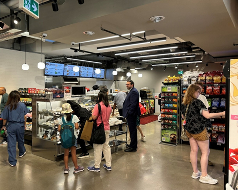 Customers select fresh food on the go at the opening of the new Rabba location at the corner of Bay St. and Gerrard St., July 12, 2024. (Photo: Business Wire)