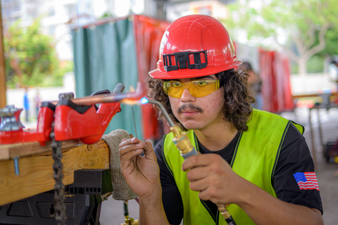 A student from the Boys and Girls Clubs of Los Angeles Harbor demonstrates his welding skills after participating in the L.A. County Skilled Trades Summers program that pays teens to learn in-demand trades. (Photo: Business Wire)
