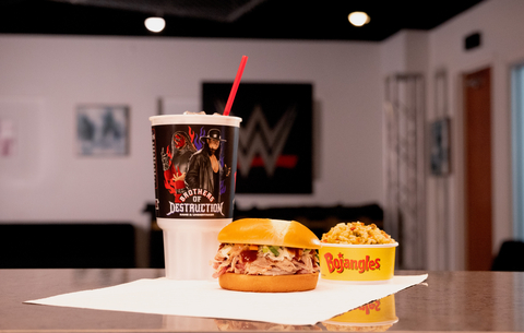 Bojangles, the beloved Carolina-born restaurant chain known for its legendary flavor, announces the return of its BBQ Pulled Pork Sandwich for a limited time only. This year, fans can enjoy the delicious BBQ Pulled Pork Sandwich with an extra special side. Throughout the month of July, and while supplies last, Bojangles is partnering with WWE to celebrate Legendary Tag Teams. When fans purchase a Bojangles WWE Sandwich Combo, including the BBQ Pulled Pork, they will receive a collectible cup featuring some of the greatest WWE Tag Teams in history: The Brothers of Destruction, The Outsiders, The Hart Foundation and The Dudley Boyz. (Photo: Business Wire)