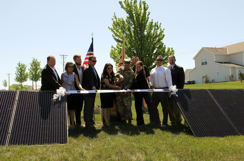 At Fort Riley, Kansas, representatives from Corvias, their energy partners and the U.S. Army cut the ribbon on a solar project expected to generate $240 million in utility savings over the next 30 years. (Photo: Business Wire)