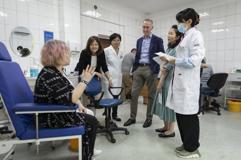 Anne Aslett (CEO, Elton John AIDS Foundation) and Daniel O'Day (Chairman and CEO, Gilead Sciences) visit RADIAN Model City in Kazakhstan.  (Photo: Business Wire)