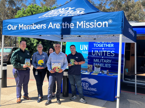 Navy Federal's San Diego Operations leadership team welcomes United Through Reading's Mobile Story Station. (Photo: Business Wire)