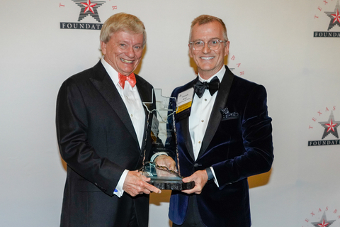 Rusty Hardin, the Texas Bar Foundation’s 2024 Ronald D. Secrest Outstanding Trial Lawyer award winner, is congratulated by Patrick Keel, Texas Bar Foundation's Past Fellows Chair. (Photo: Business Wire)