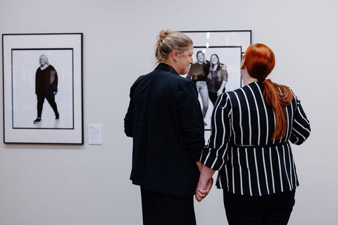 Connie, a featured patient, reviews her portrait alongside her whole-person specialty care health coach. (Photo: Megan Barnard)