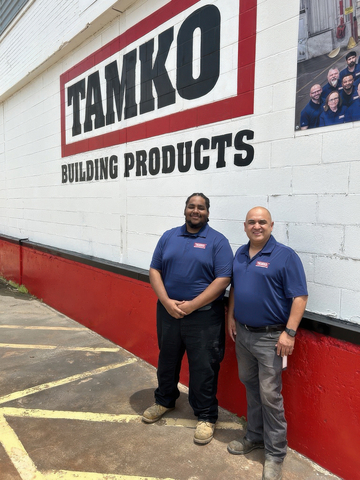 Kynan DeSquare (left), summer engineering intern at TAMKO’s Dallas plant with one of his TAMKO mentor’s Lawrance Aguilar. (Photo: Business Wire)