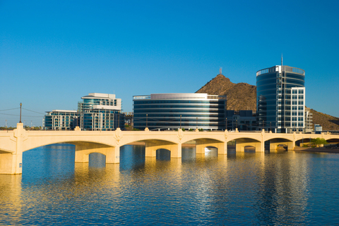 Phoenix suburb, the satellite city of Tempe, with the Tempe city skyline, Hayden Butte (hill), Tempe Town Lake (part of Salt River), and Mill Avenue Bridge. (Photo: Business Wire)