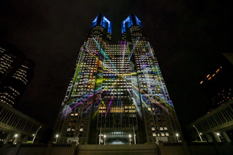 YOASOBI / Butai ni Tatte (Standing on the Stage)  </div> <p>An artwork, combining YOASOBI's up-tempo vocal and instrumental music with a riot of images and colors, made its debut on the TOKYO Night & Light program on July 26. The nightly show uses the exterior of the 243-meter-tall Tokyo Metropolitan Government (TMG) No. 1 Building as its screen. Three other projections created by internationally acclaimed artists also joined the menu over the same weekend. </p> <p>YOASOBI - female vocalist Ikura, 23, and male singer-songwriter Ayase, 30 - has contributed the newly composed 